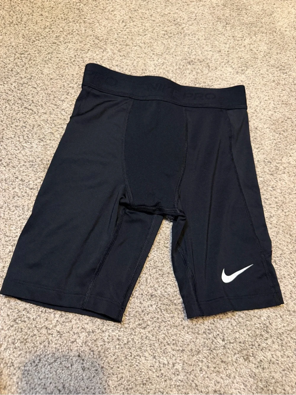 Nike Black Kids Athletic Compression Leggings with White Swoosh